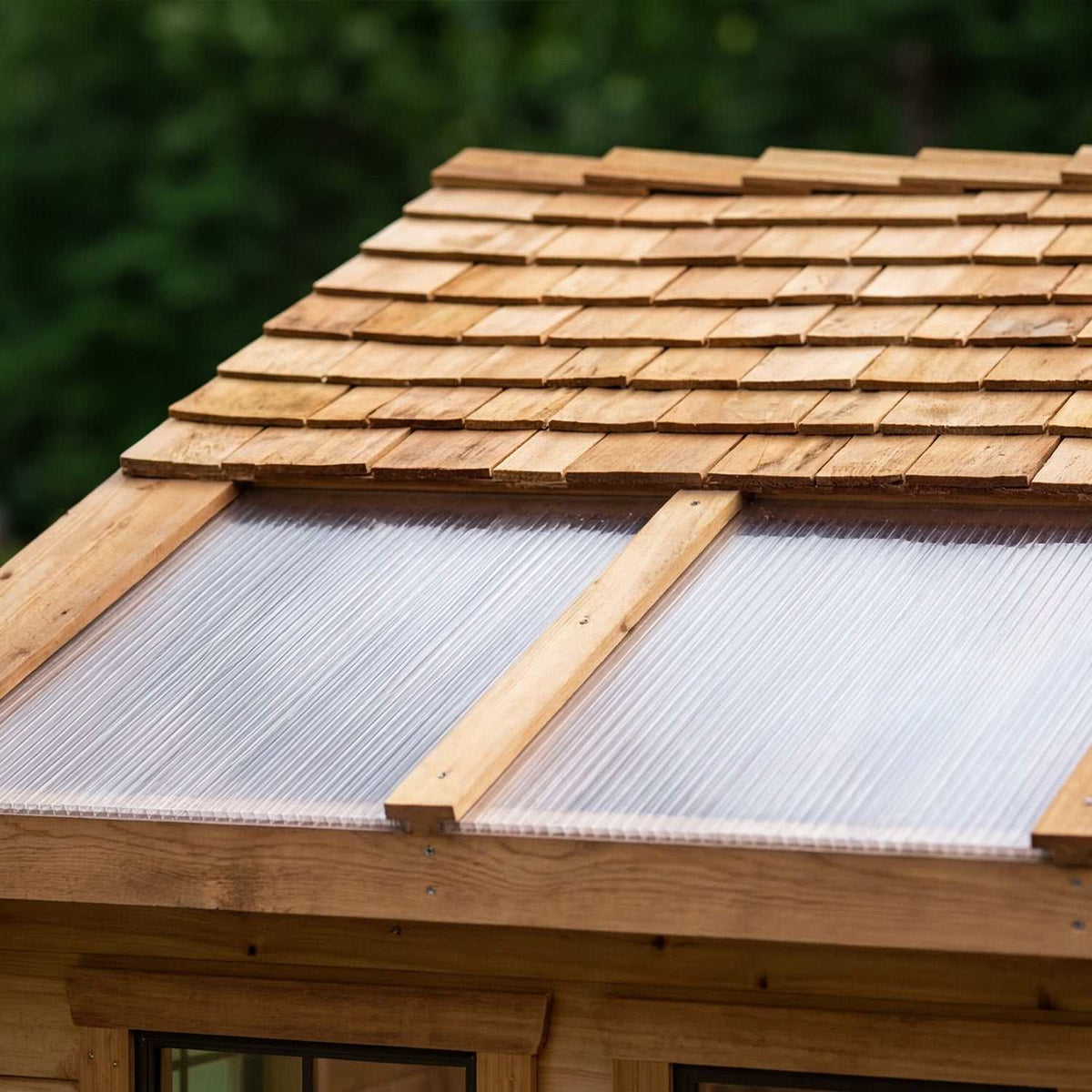 Western Red Cedar Sunshed roof with natural cedar shingles and translucent twin-wall Polygal panels